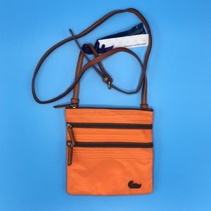 Dooney & Bourke North/South triple zip crossbody
